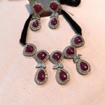 Raj says, ” this beautiful necklace set is a perfect match with her saree.”